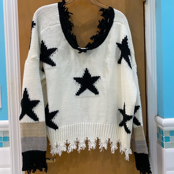 Storia Sweaters - Oversized Storia sweater